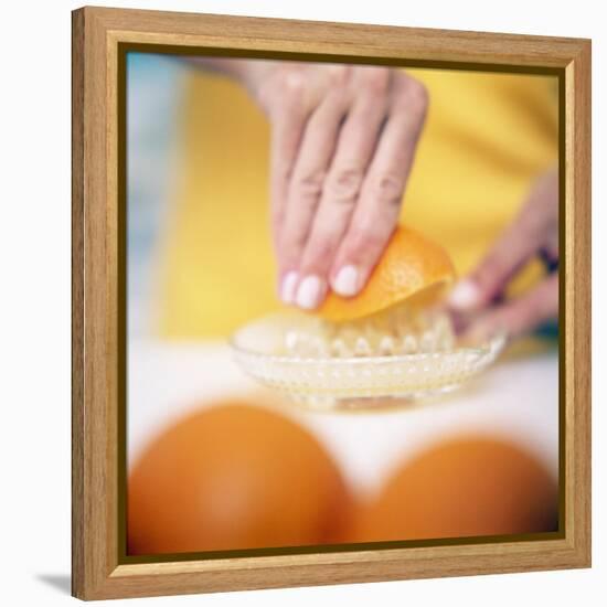 Juicing Oranges-Cristina-Framed Premier Image Canvas