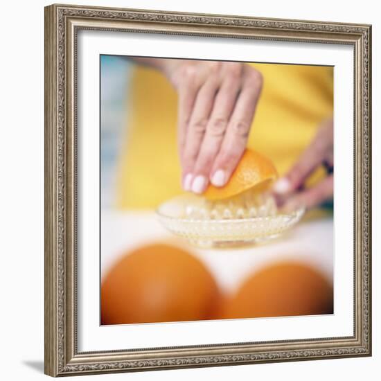 Juicing Oranges-Cristina-Framed Premium Photographic Print