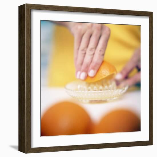 Juicing Oranges-Cristina-Framed Premium Photographic Print