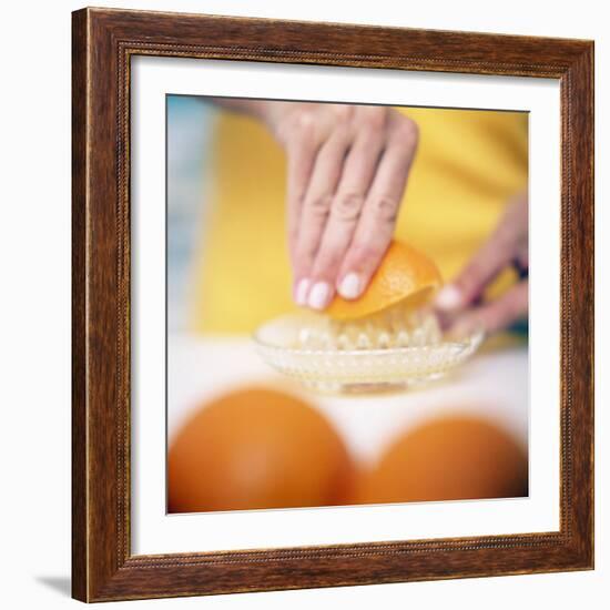 Juicing Oranges-Cristina-Framed Premium Photographic Print