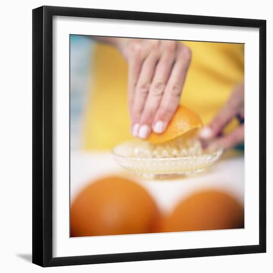 Juicing Oranges-Cristina-Framed Premium Photographic Print