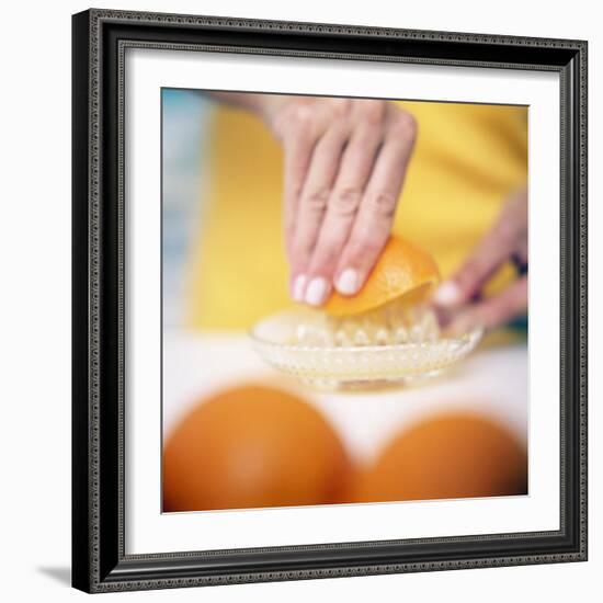 Juicing Oranges-Cristina-Framed Premium Photographic Print