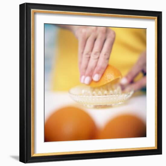 Juicing Oranges-Cristina-Framed Premium Photographic Print