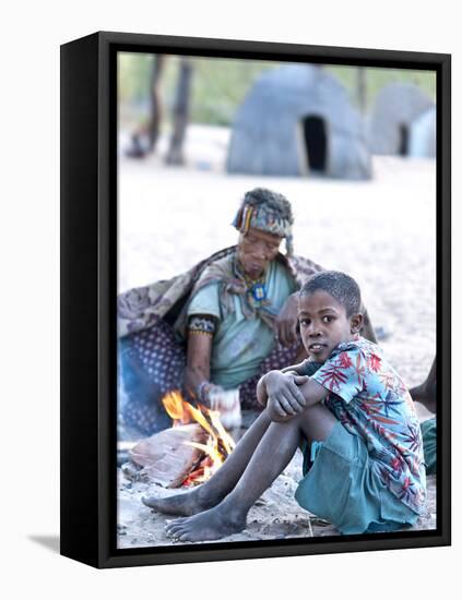 Jul'Hoan !Kung Bushman Boy and His Grandmother in their Village, Bushmanland, Namibia-Kim Walker-Framed Premier Image Canvas