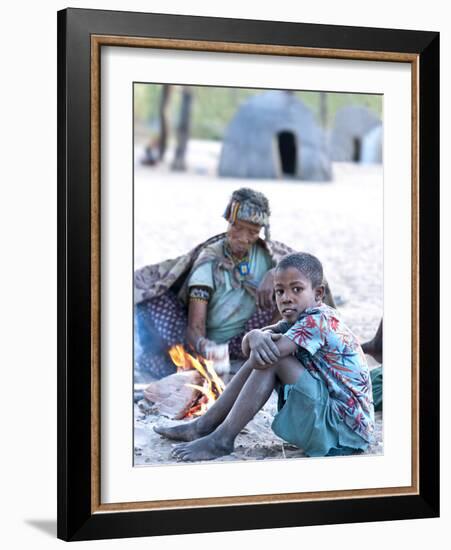 Jul'Hoan !Kung Bushman Boy and His Grandmother in their Village, Bushmanland, Namibia-Kim Walker-Framed Photographic Print