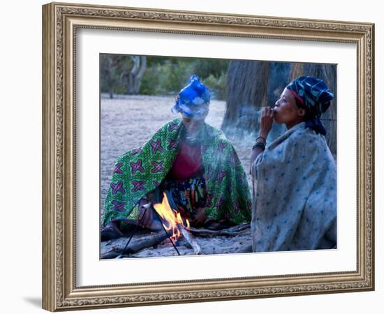 Jul'Hoan !Kung Bushman, Two Women Smoke around Fire in Village, Bushmanland, Namibia-Kim Walker-Framed Photographic Print