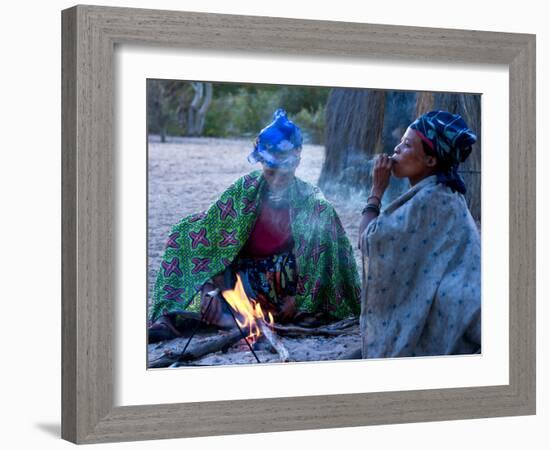Jul'Hoan !Kung Bushman, Two Women Smoke around Fire in Village, Bushmanland, Namibia-Kim Walker-Framed Photographic Print