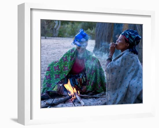 Jul'Hoan !Kung Bushman, Two Women Smoke around Fire in Village, Bushmanland, Namibia-Kim Walker-Framed Photographic Print