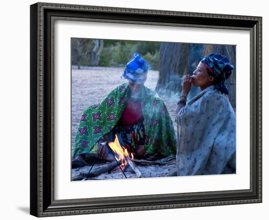 Jul'Hoan !Kung Bushman, Two Women Smoke around Fire in Village, Bushmanland, Namibia-Kim Walker-Framed Photographic Print