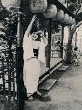 'Sweet natured smile of tea-house maid, called nesan - elder sister', c1900, (1921)-Julian Leonard Street-Framed Photographic Print