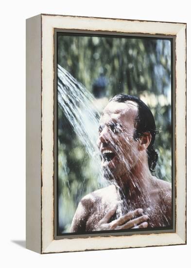 Julio Iglesias Having a Shower-Angelo Cozzi-Framed Premier Image Canvas