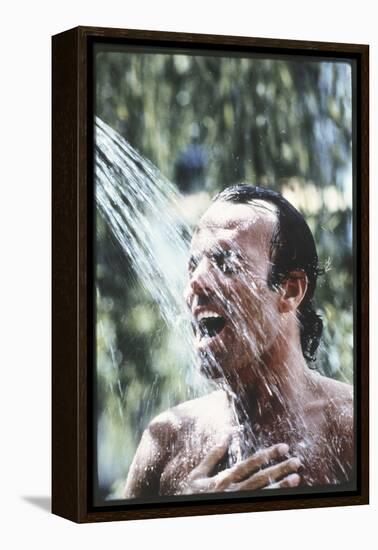 Julio Iglesias Having a Shower-Angelo Cozzi-Framed Premier Image Canvas