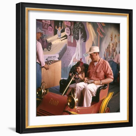 July 17 1955: Guests in the Mr Toad Wild Ride, Disneyland, Anaheim, California-Loomis Dean-Framed Photographic Print