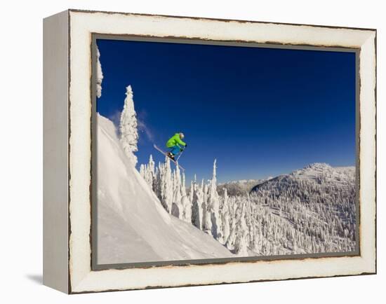 Jumping from Cliff on a Sunny Day at Whitefish Mountain Resort, Montana, Usa-Chuck Haney-Framed Premier Image Canvas