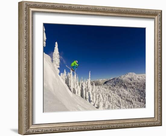 Jumping from Cliff on a Sunny Day at Whitefish Mountain Resort, Montana, Usa-Chuck Haney-Framed Photographic Print