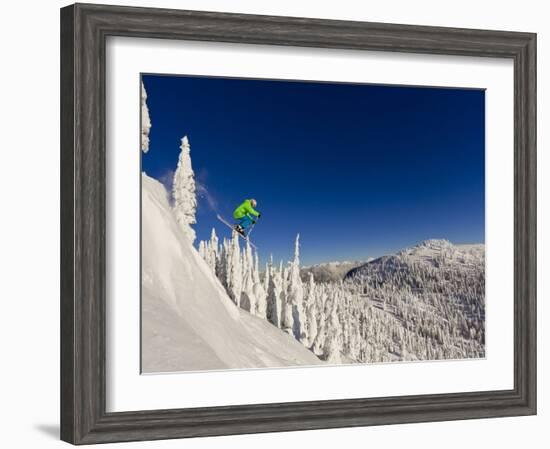 Jumping from Cliff on a Sunny Day at Whitefish Mountain Resort, Montana, Usa-Chuck Haney-Framed Photographic Print