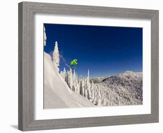 Jumping from Cliff on a Sunny Day at Whitefish Mountain Resort, Montana, Usa-Chuck Haney-Framed Photographic Print