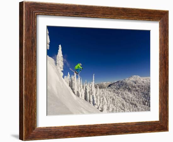 Jumping from Cliff on a Sunny Day at Whitefish Mountain Resort, Montana, Usa-Chuck Haney-Framed Photographic Print