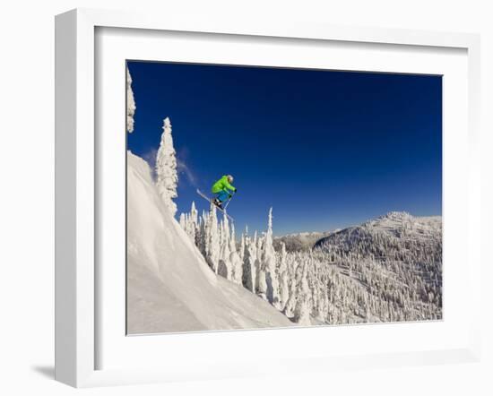 Jumping from Cliff on a Sunny Day at Whitefish Mountain Resort, Montana, Usa-Chuck Haney-Framed Photographic Print