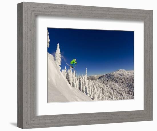 Jumping from Cliff on a Sunny Day at Whitefish Mountain Resort, Montana, Usa-Chuck Haney-Framed Photographic Print