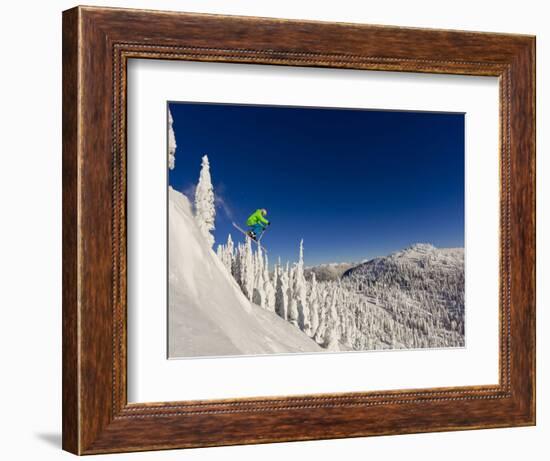 Jumping from Cliff on a Sunny Day at Whitefish Mountain Resort, Montana, Usa-Chuck Haney-Framed Photographic Print