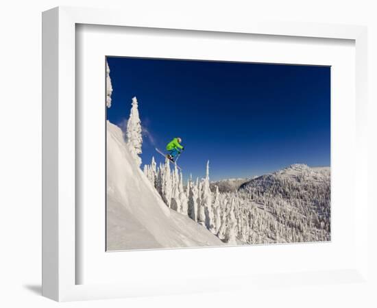 Jumping from Cliff on a Sunny Day at Whitefish Mountain Resort, Montana, Usa-Chuck Haney-Framed Photographic Print