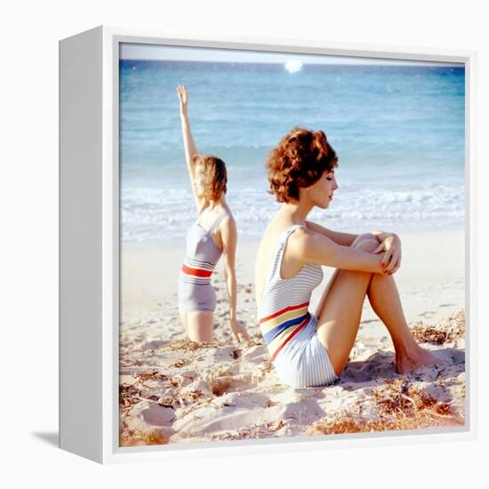 June 1956: Girls in Striped Swimsuit Modeling Beach Fashions in Cuba-Gordon Parks-Framed Premier Image Canvas