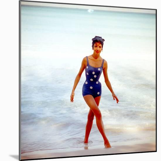 June 1956: Woman in Polka-Dot Swimsuit Modeling Beach Fashions in Cuba-Gordon Parks-Mounted Photographic Print