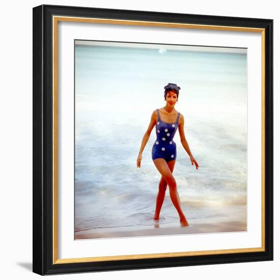 June 1956: Woman in Polka-Dot Swimsuit Modeling Beach Fashions in Cuba-Gordon Parks-Framed Photographic Print