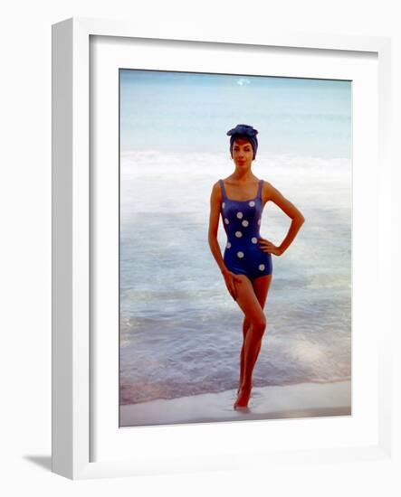 June 1956: Woman in Polka-Dot Swimsuit Modeling Beach Fashions in Cuba-Gordon Parks-Framed Photographic Print