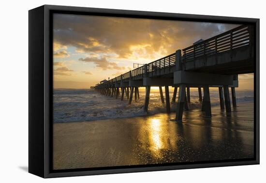 Juno Beach, Florida. Juno Beach Pier at sunrise with high surf-Jolly Sienda-Framed Premier Image Canvas