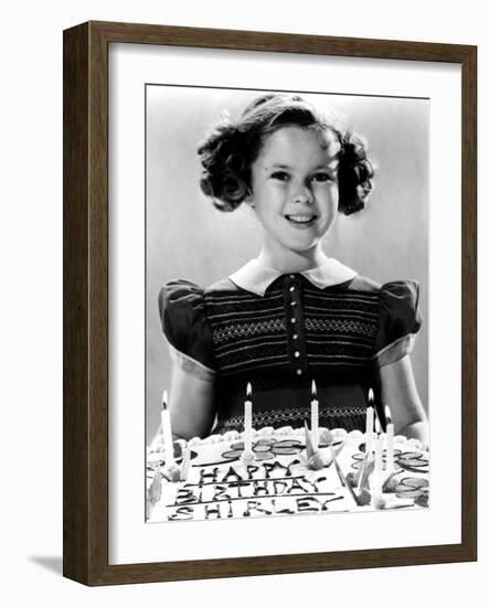 Just Around the Corner, Shirley Temple with Her Birthday Cake, on Set, 1938-null-Framed Photo