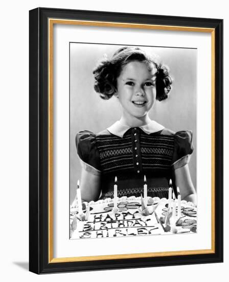 Just Around the Corner, Shirley Temple with Her Birthday Cake, on Set, 1938-null-Framed Photo