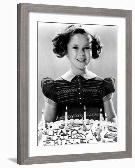 Just Around the Corner, Shirley Temple with Her Birthday Cake, on Set, 1938-null-Framed Photo