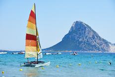 Scenic Italy Sardinia Beach Resort Landscape with Sail Boat and Mountains-kadmy-Photographic Print