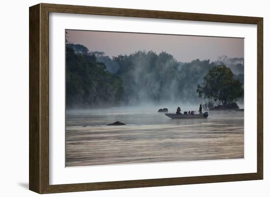 Kafue NP, Zambia. Tourist On A Boat Tour Of Kafue River Enjoys Morning Mist Before The Sun Rises-Karine Aigner-Framed Photographic Print