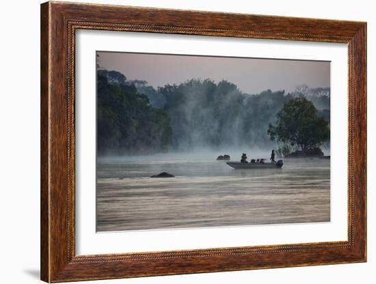 Kafue NP, Zambia. Tourist On A Boat Tour Of Kafue River Enjoys Morning Mist Before The Sun Rises-Karine Aigner-Framed Photographic Print