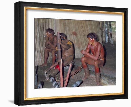 Kamayura Indians Playing Flutes Inside Hut, Xingu Area, Brazil, South America-Robin Hanbury-tenison-Framed Photographic Print