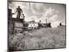 Kansas Farmer Driving Farmall Tractor as He Pulls a Manned Combine During Wheat Harvest-Margaret Bourke-White-Mounted Premium Photographic Print