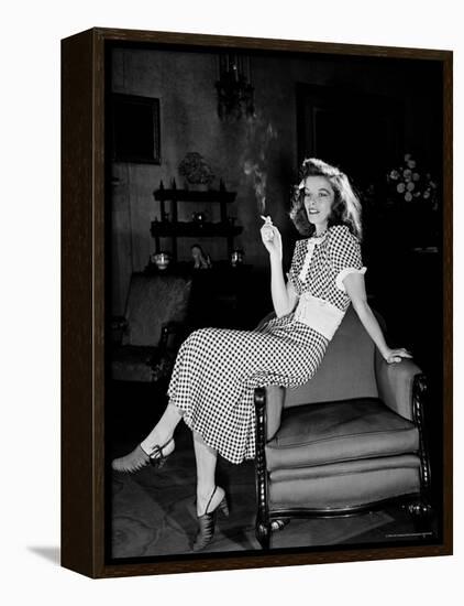 Katharine Hepburn in chair Smoking Cigarette in Scene from Broadway Show "The Philadelphia Story"-Alfred Eisenstaedt-Framed Premier Image Canvas