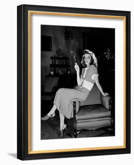 Katharine Hepburn in chair Smoking Cigarette in Scene from Broadway Show "The Philadelphia Story"-Alfred Eisenstaedt-Framed Premium Photographic Print