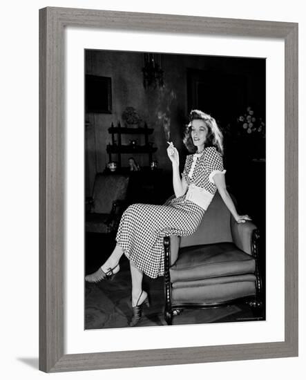 Katharine Hepburn in chair Smoking Cigarette in Scene from Broadway Show "The Philadelphia Story"-Alfred Eisenstaedt-Framed Premium Photographic Print