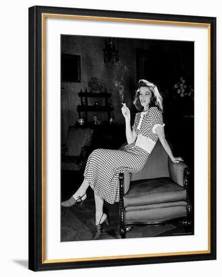 Katharine Hepburn in chair Smoking Cigarette in Scene from Broadway Show "The Philadelphia Story"-Alfred Eisenstaedt-Framed Premium Photographic Print