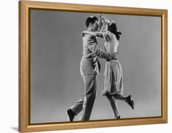 Kaye Popp and Stanley Catron Demonstrating a Step of the Lindy Hop-Gjon Mili-Framed Premier Image Canvas