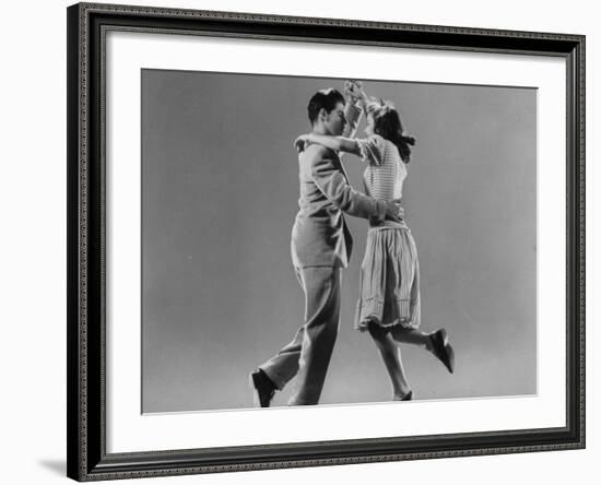 Kaye Popp and Stanley Catron Demonstrating a Step of the Lindy Hop-Gjon Mili-Framed Premium Photographic Print
