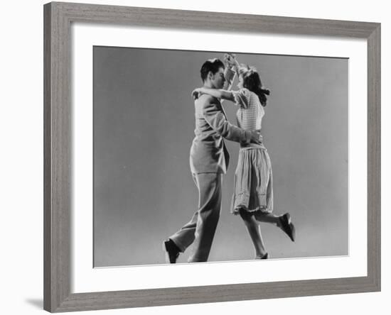 Kaye Popp and Stanley Catron Demonstrating a Step of the Lindy Hop-Gjon Mili-Framed Premium Photographic Print