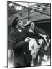 Keeper,T. Raggett Feeding a Great Indian Hornbill with a Fruit Held in His Mouth. London Zoo 1924-Frederick William Bond-Mounted Giclee Print