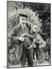 Keeper Z. Rodwell Holding Young Orangutan at London Zoo, October 1913-Frederick William Bond-Mounted Photographic Print