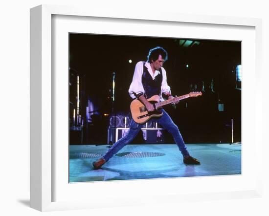 Keith Richards During a Performance by the Rolling Stones-null-Framed Premium Photographic Print