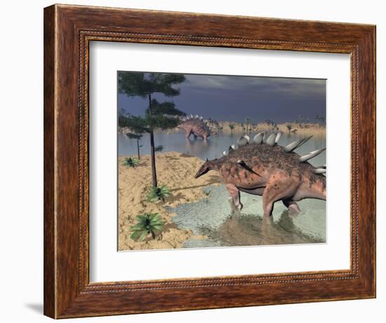 Kentrosaurus Dinosaurs Walking in the Water Next to Sand and Trees-null-Framed Premium Giclee Print